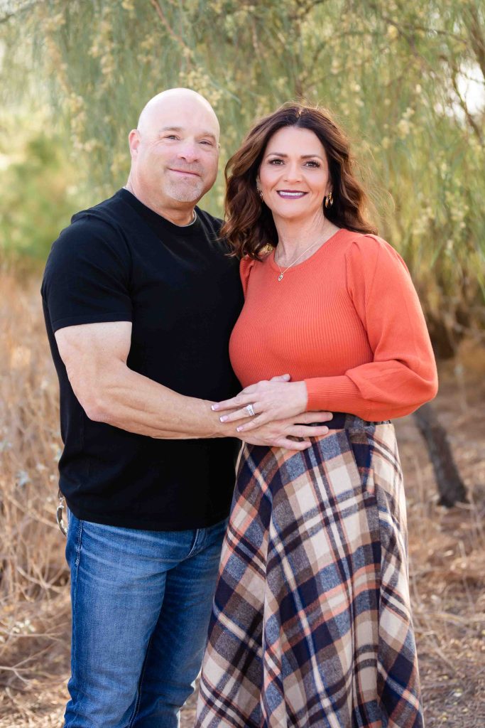 Optimal Mens Wellness owners outdoors together